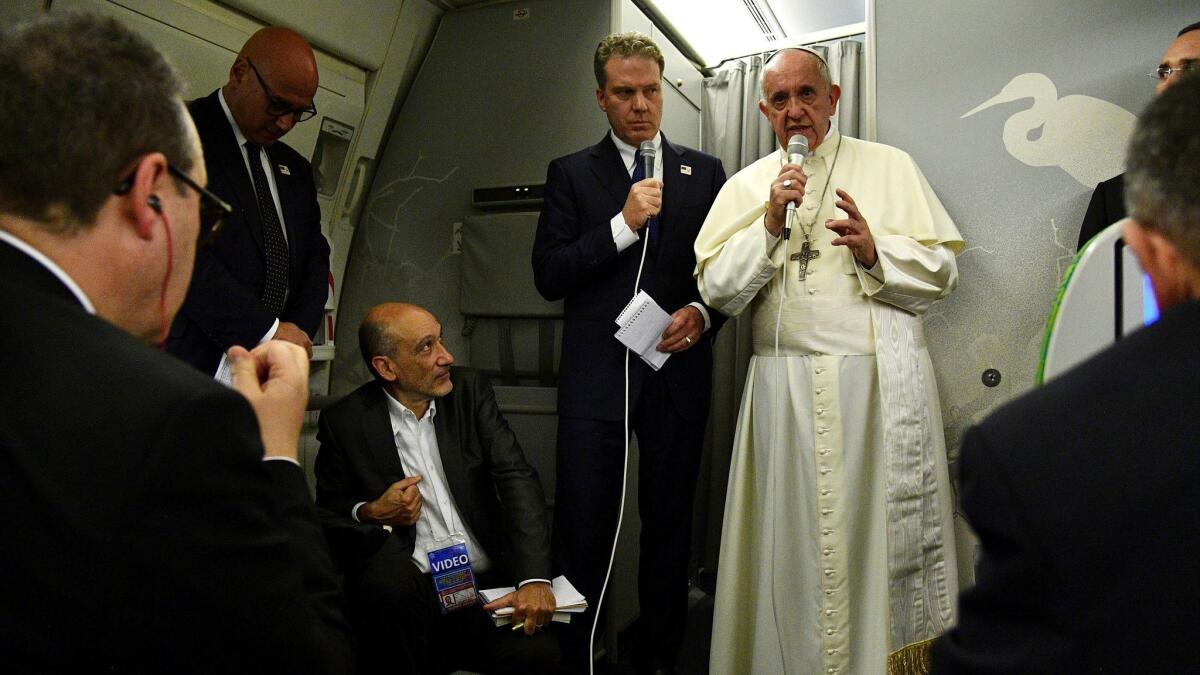 Pope Francis at a news conference on the return flight to Rome on Dec. 2, 2017, after a seven-day trip to Myanmar and Bangladesh.
