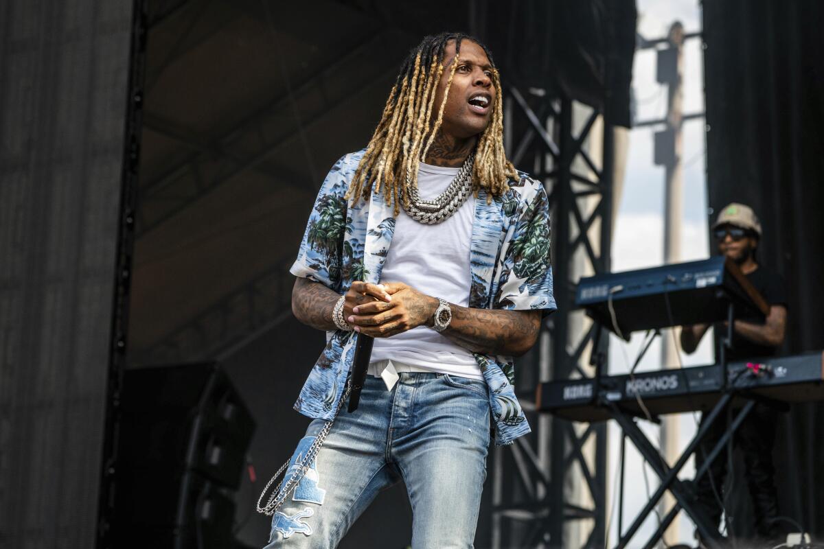 Lil Durk hit in the eye by a pyrotechnic at Lollapalooza - Los Angeles Times