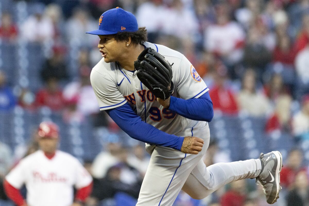 New York Mets starting pitcher Taijuan Walker throws during the first inning of a baseball game against the Philadelphia Phillies, Monday, April 11, 2022, in Philadelphia. (AP Photo/Laurence Kesterson)