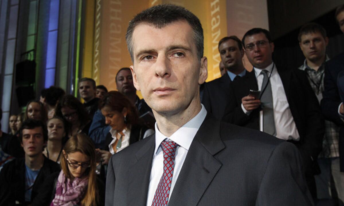 Brooklyn Nets owner Mikhail Prokhorov says he doesn't need to be courtside in order to watch his team play.