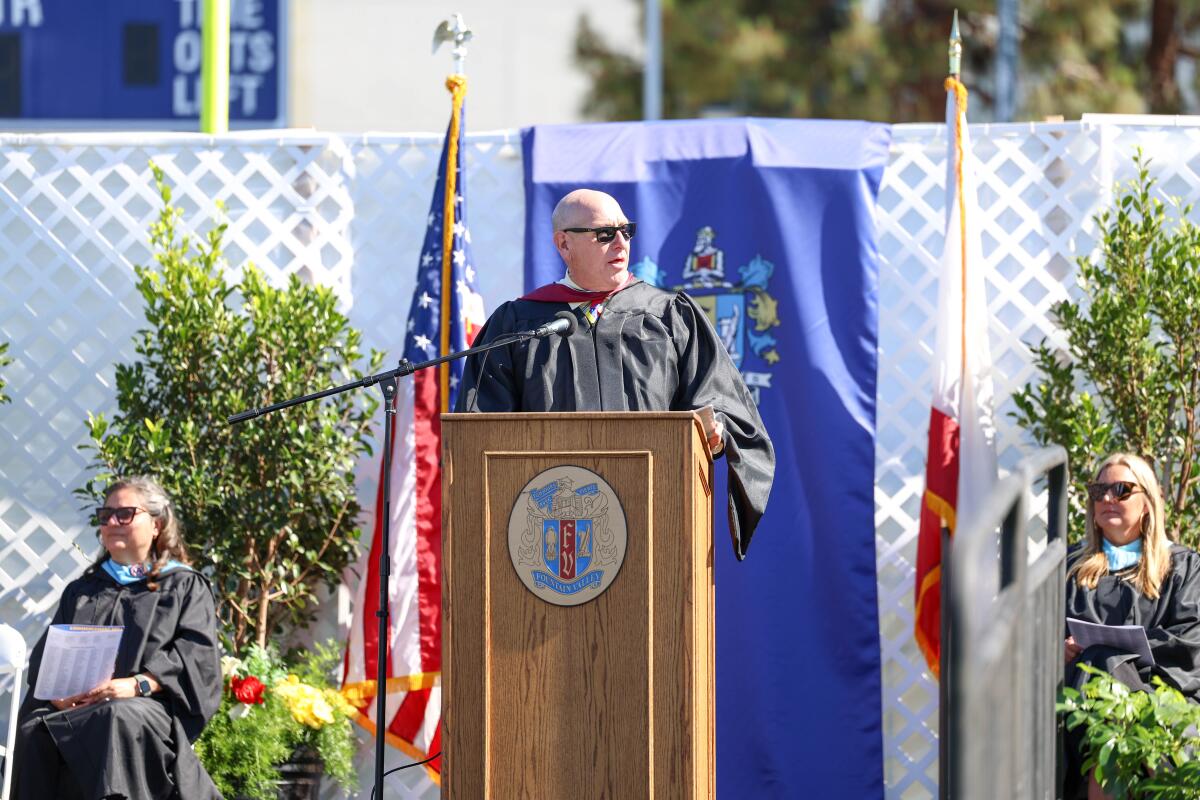 Fountain Valley Principal Paul Lopez delivers remarks during a commencement ceremony on Wednesday at Orange Coast College.