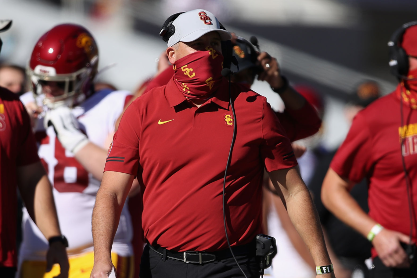 TUCSON, ARIZONA - NOVEMBER 14: Head coach Clay Helton watches from the sideline