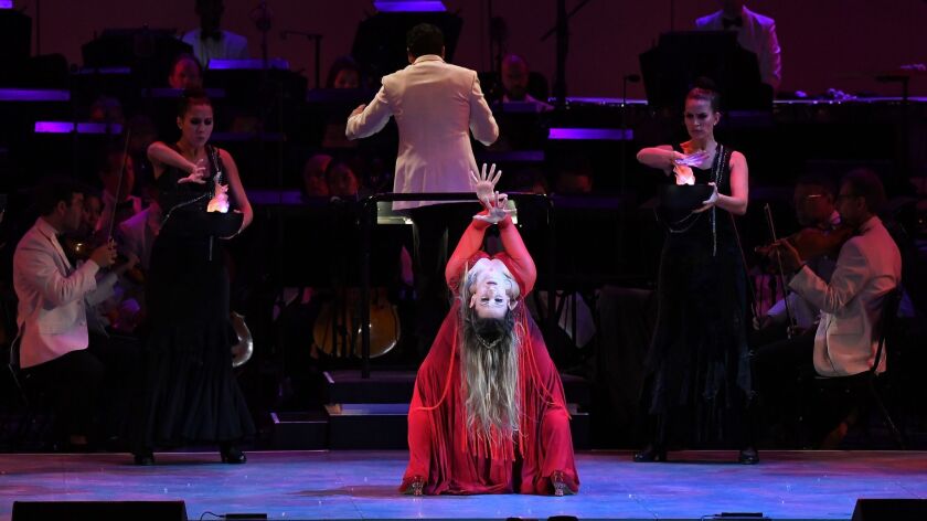 Flamenco dancer, choreographer and costume designer Siudy Garrido stars in Manuel de Falla's "El Amor Brujo," performed with her Siudy Flamenco Dance Theater and the Los Angeles Philharmonic conducted by Paolo Bortolameolli, at the Hollywood Bowl on Tuesday night.