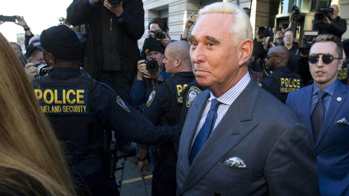 Roger Stone, a former campaign advisor for President Trump, leaves federal court in Washington on Thursday. A judge imposed a full gag order on Stone after he posted a photo on Instagram of the judge with what appeared to be the crosshairs of a gunsight.