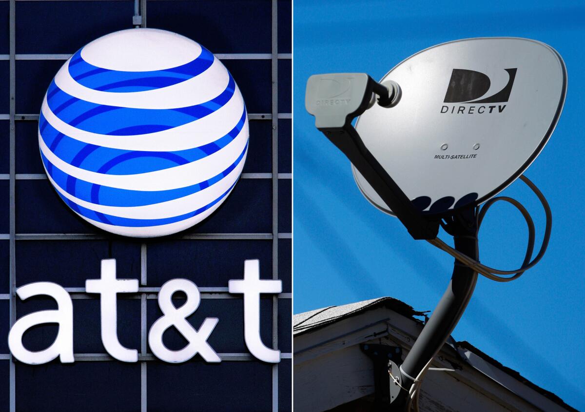 FILE - combo AT&T logo y DirecTV.