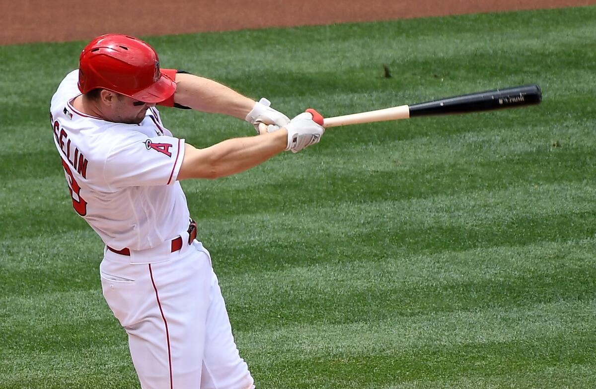 Angels Phil Gosselin hits a solo home run against the Minnesota Twins.
