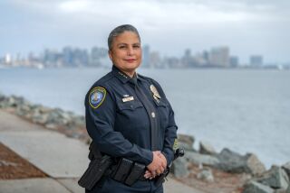 This photo appears on the February-March cover of Seapower magazine. Magda Fernandez is the chief of San Diego Harbor Police.