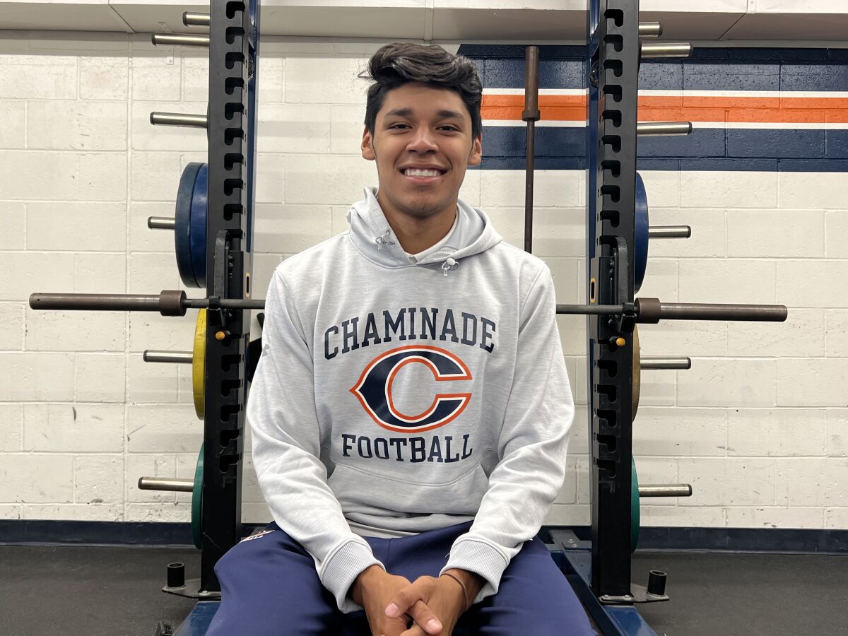 Chaminade free safety Marquis Gallegos sits and smiles in front of some free weights.