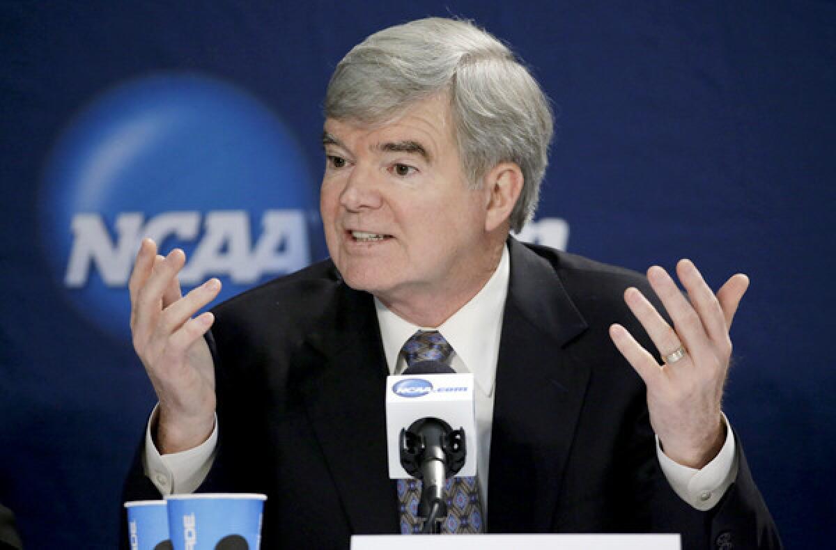 NCAA President Mark Emmert answers a question during a news conference Sunday in Arlington, Texas.