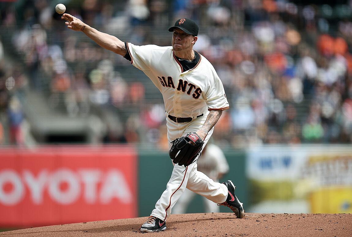 Former White Sox and current San Francisco starter Jake Peavy pitches in the first inning against Chicago.
