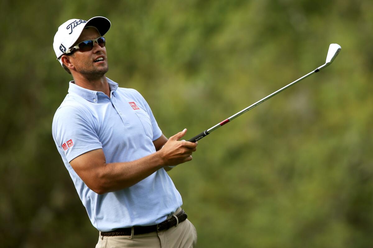 Adam Scott hits off the 17th tee Thursday during the first round of the Valspar Championship in Palm Harbor, Fla.