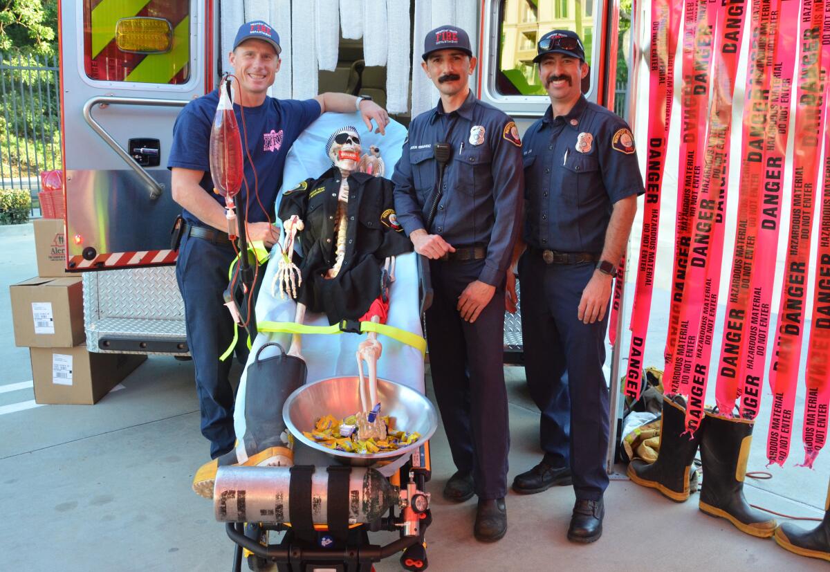  Adam Novak, Jason Fernandez and Rick Lazar of the Newport Beach Fire Department. 