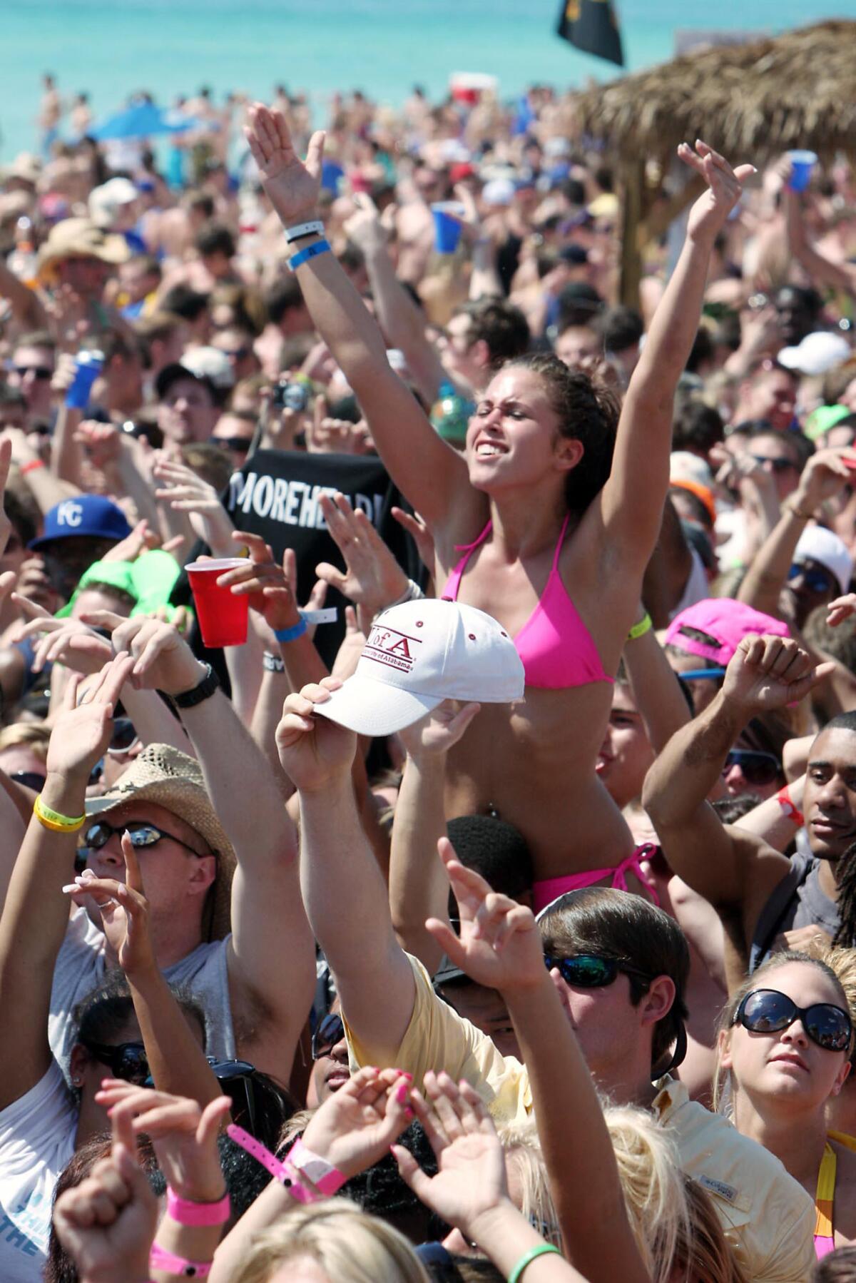 Crowds celebrate spring break action in this file shot from Panama City Beach, which topped Facebook's list.