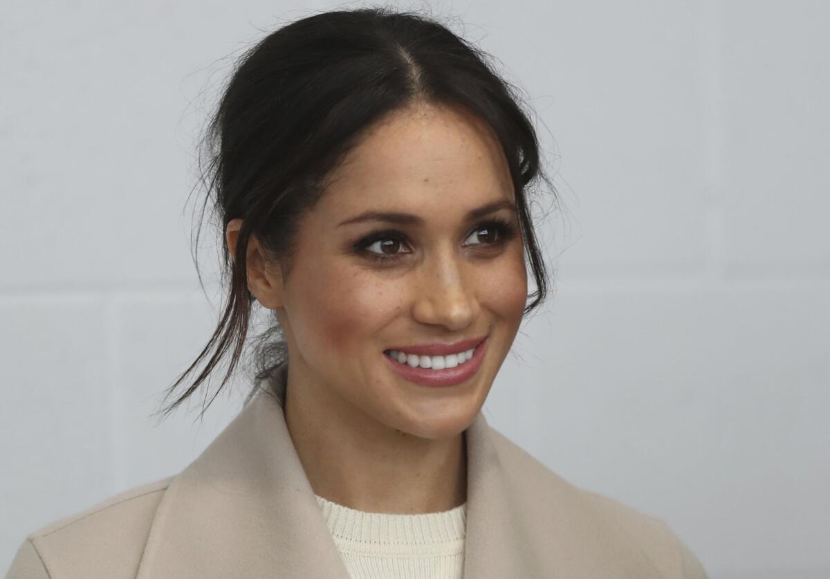 Meghan Markle smiles during a visit with Prince Harry to Northern Ireland in March 2018.