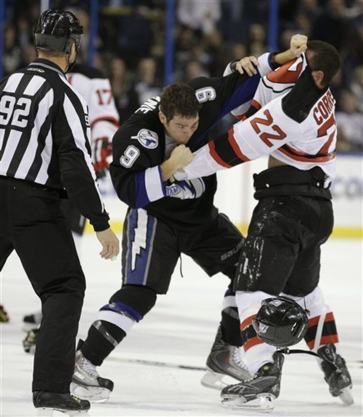 New Jersey Devils Colin White (5) and Tampa Bay Lightning Dan