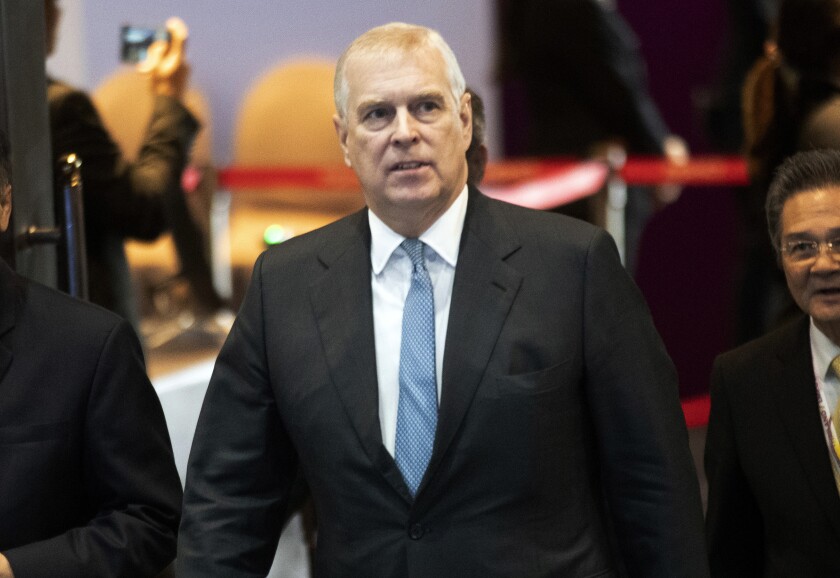 FILE - Britain's Prince Andrew arrives at ASEAN Business and Investment Summit (ABIS) in Nonthaburi, Thailand, Sunday, Nov. 3, 2019. Britain’s Prince Andrew has given up his honorary membership of the Royal & Ancient Golf Club of St. Andrews, one of the world’s most prestigious golf clubs, as he fights allegations of sexual abuse that have forced him to retreat from public life. The club in St. Andrews, Scotland, announced the move Friday, Jan. 28, 2022. (AP Photo/Sakchai Lalit, file)