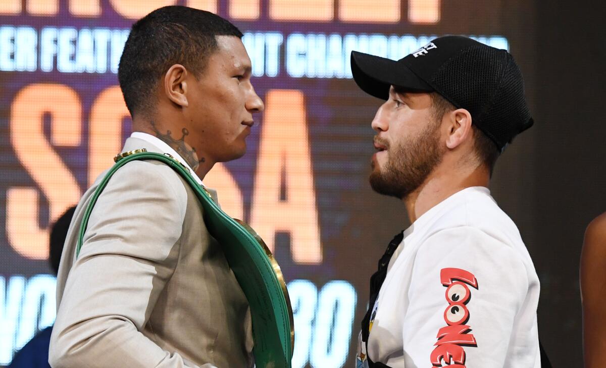 Miguel Berchelt, left, will look to defend his WBC junior-lightweight title against Jason Sosa on Saturday at Dignity Health Sports Park.