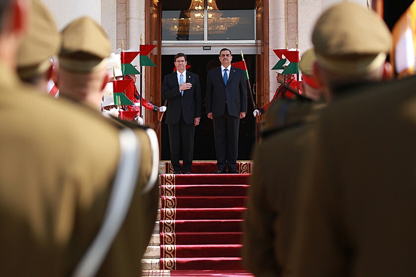 U.S. Defense Secretary Mark Esper, left, and Iraqi Defense Minister Najah Shammari take part in a welcome ceremony Oct. 23 at the Ministry of Defense in Baghdad.