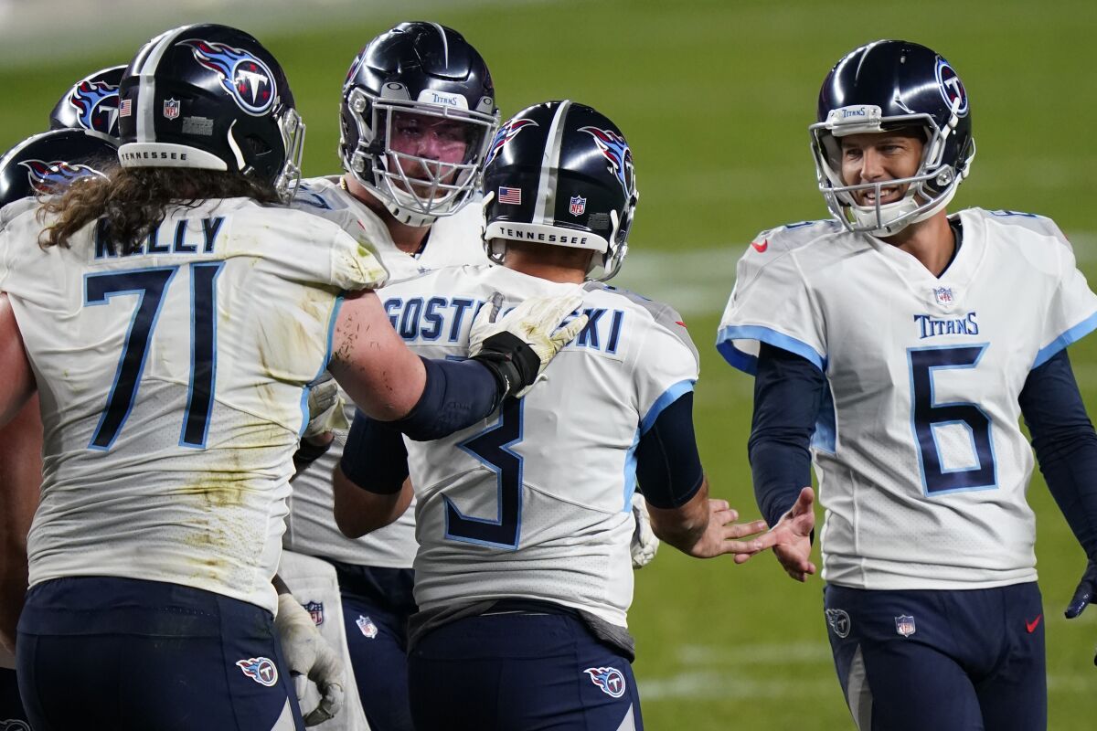 Tennessee Titans kicker Stephen Gostkowski (3) celebrates his game winning field goal with teammates during the second half of an NFL football game against the Denver Broncos, Monday, Sept. 14, 2020, in Denver. The Titans won 16-14. (AP Photo/David Zalubowski)