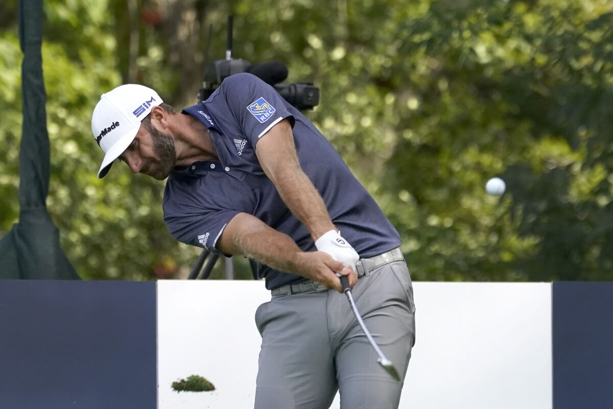 Dustin Johnson hits his tee shot on the 16th hole during the third round at the BMW Championship on  Aug. 29, 2020.