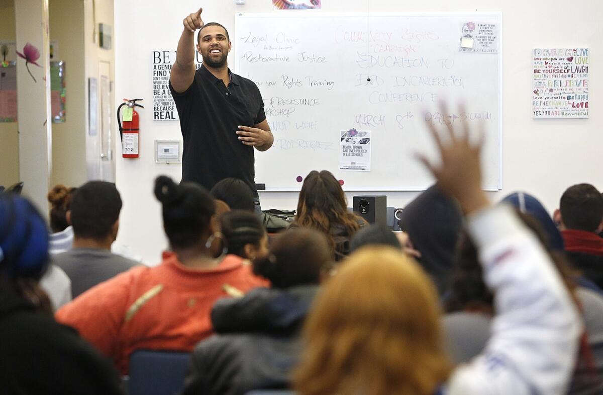 Prophet Walker, a candidate for state Assembly from the Carson/Compton area, takes questions while speaking to students at Compton YouthBuild. A big part of Walker's pitch for state office is that he will be a role model for young people on how to turn their lives around.