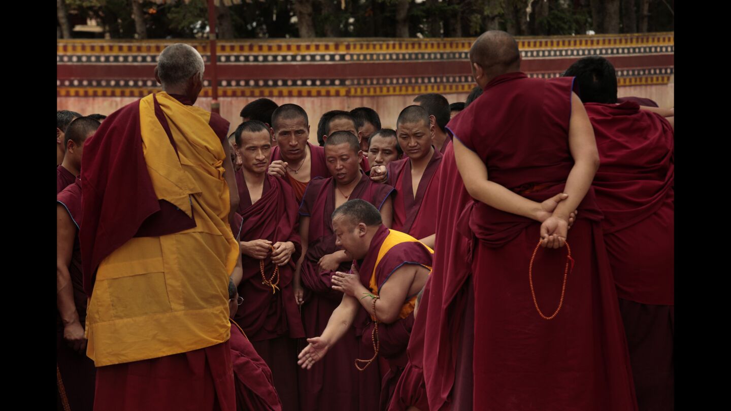 Monks gather for debates in the courtyard at Kirti Monastery in Aba, in Sichuan province.