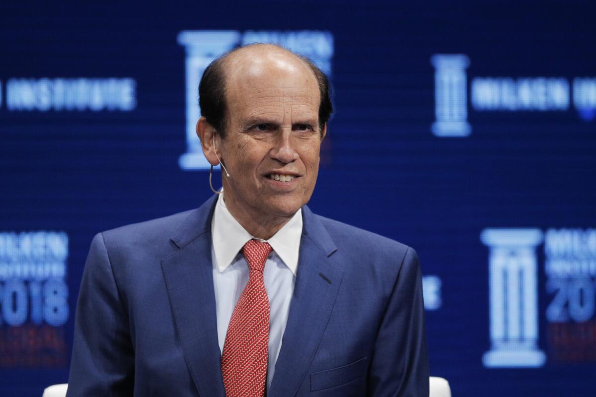 Michael Milken leads a discussion at the Milken Institute Global Conference in April 2018 in Beverly Hills.