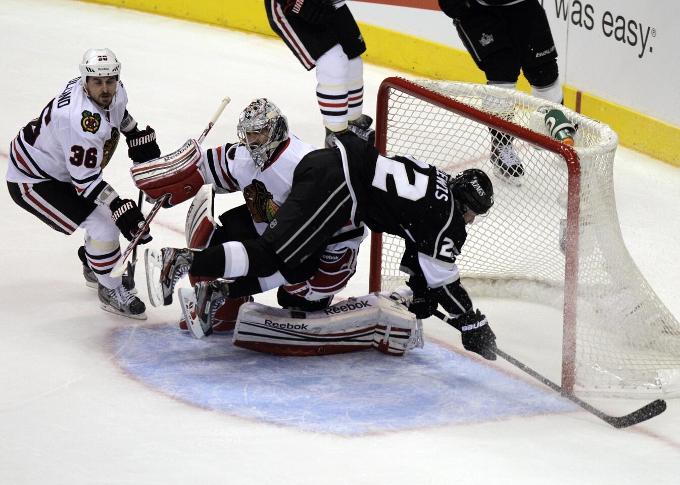 Trevor Lewis, Corey Crawford