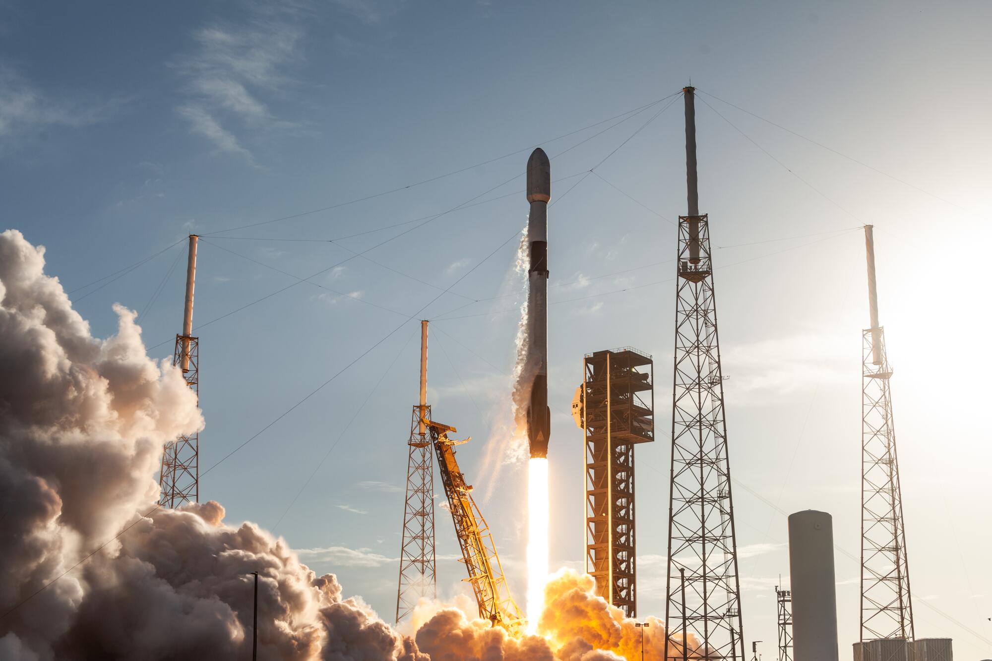 A SpaceX Falcon 9 rocket lifts off from launchpad 40 at the Cape Canaveral Space Force Station