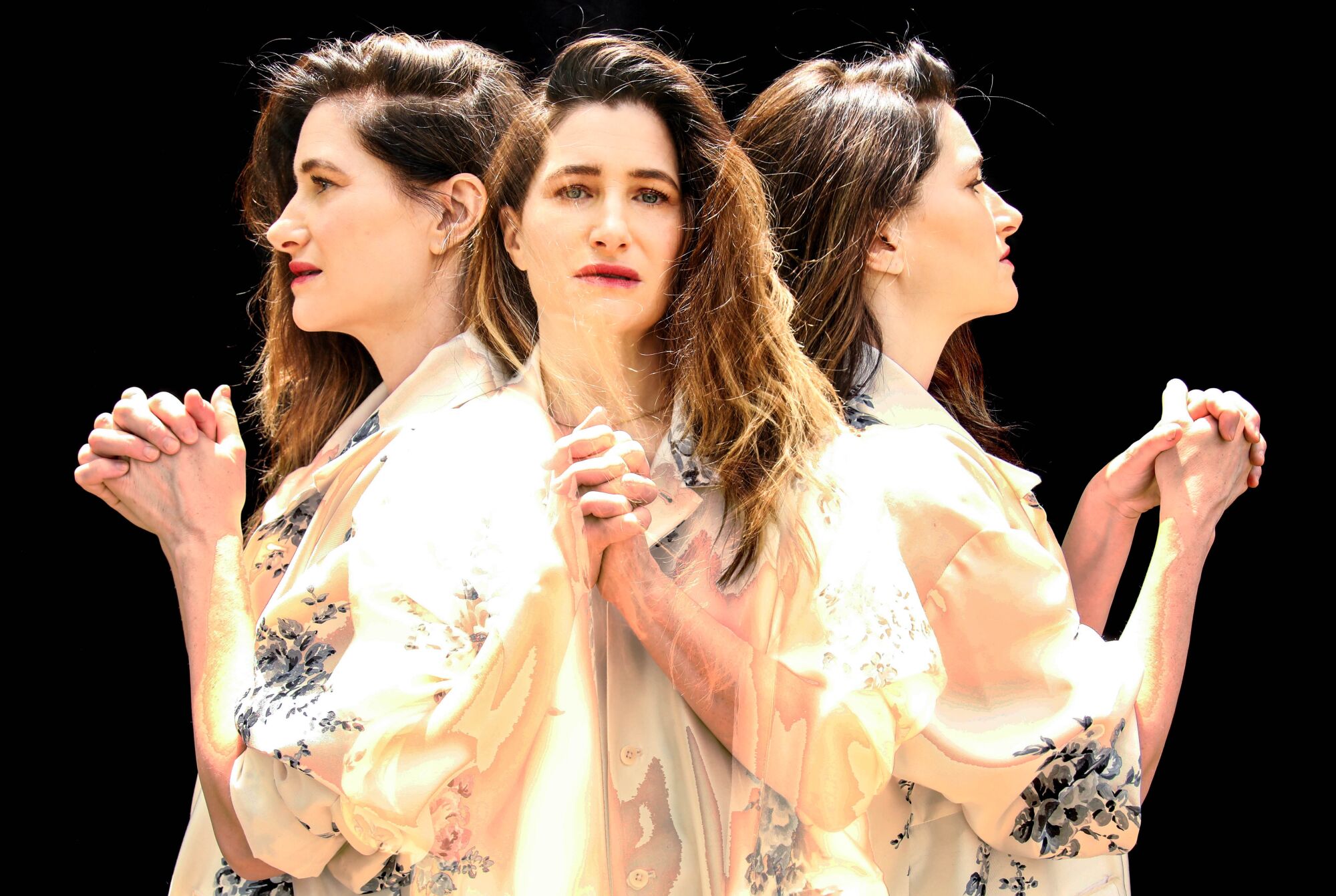 Kathryn Hahn clasps her hands together in a triple portrait.