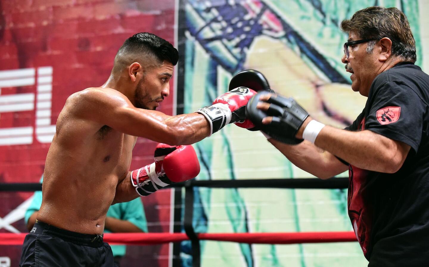 Former three division world champion boxer Abner Mares works out for the media on August 18, 2015 in Bell Gardens, California, ahead of his "Battle of Los Angeles" match against former two division world champion Leo Santa Cruz at Staples Center. The two Mexico-born, California- based boxers will square off August 29th at Staples Center I los Angeles. AFP PHOTO / FREDERIC J. BROWNFREDERIC J. BROWN/AFP/Getty Images ** OUTS - ELSENT, FPG - OUTS * NM, PH, VA if sourced by CT, LA or MoD **