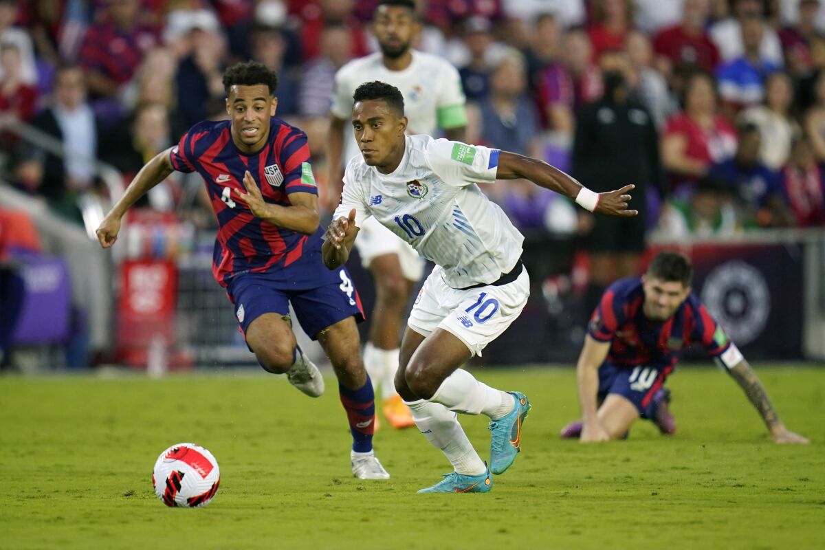 Panama's Edgar Barcenas controls the ball in front of the United States' Tyler Adams.