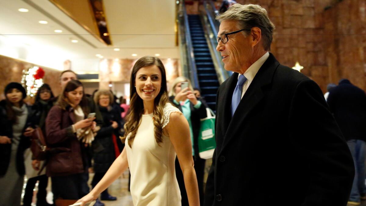 Former Texas Gov. Rick Perry is escorted into Trump Tower before meeting with President-elect Donald Trump in New York on Dec. 12.