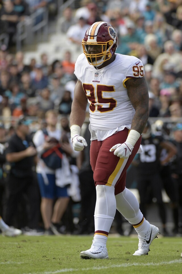 Washington Redskins nose tackle Da'Ron Payne (95) reacts after a play during the first half of an NFL football game against the Jacksonville Jaguars Sunday, Dec. 16, 2018, in Jacksonville, Fla. (AP Photo/Phelan M. Ebenhack)