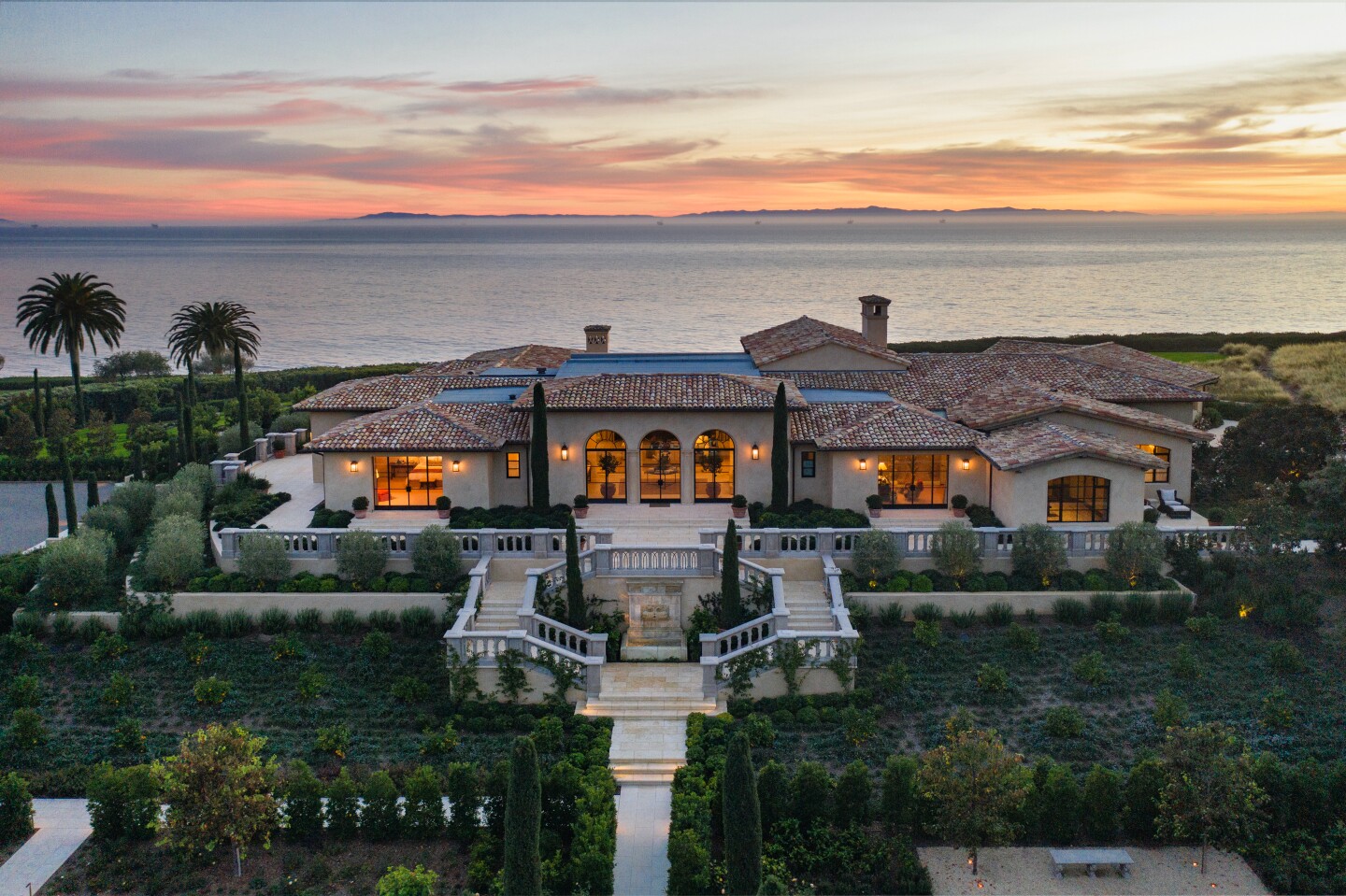 Crawling across 22 acres of oceanfront bluffs, the estate includes two custom homes that combine for 14,000 square feet.