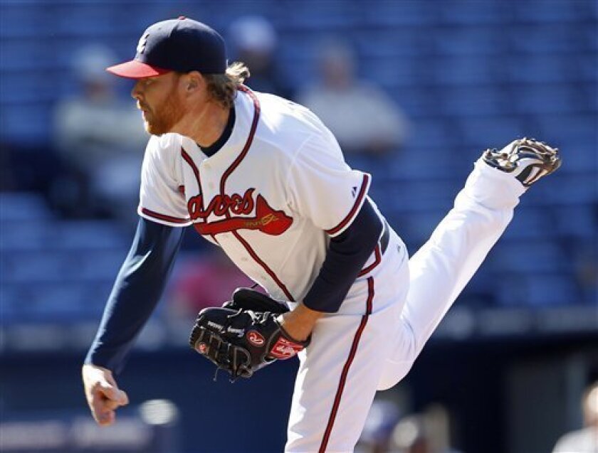 Atlanta Braves starting pitcher Tommy Hanson (48) work in the first inning in the first baseball game of a doubleheader baseball against the Milwaukee Brewers in Atlanta, Wednesday, May 4, 2011. (AP Photo/John Bazemore)