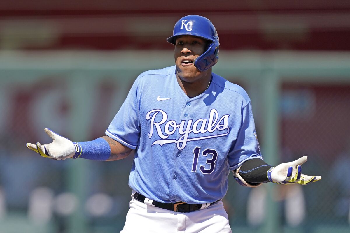 Kansas City Royals' Salvador Perez reacts after advancing to second after reaching on an error by Chicago White Sox first baseman Gavin Sheets during the third inning of a baseball game Sunday, Sept. 5, 2021, in Kansas City, Mo. (AP Photo/Charlie Riedel)