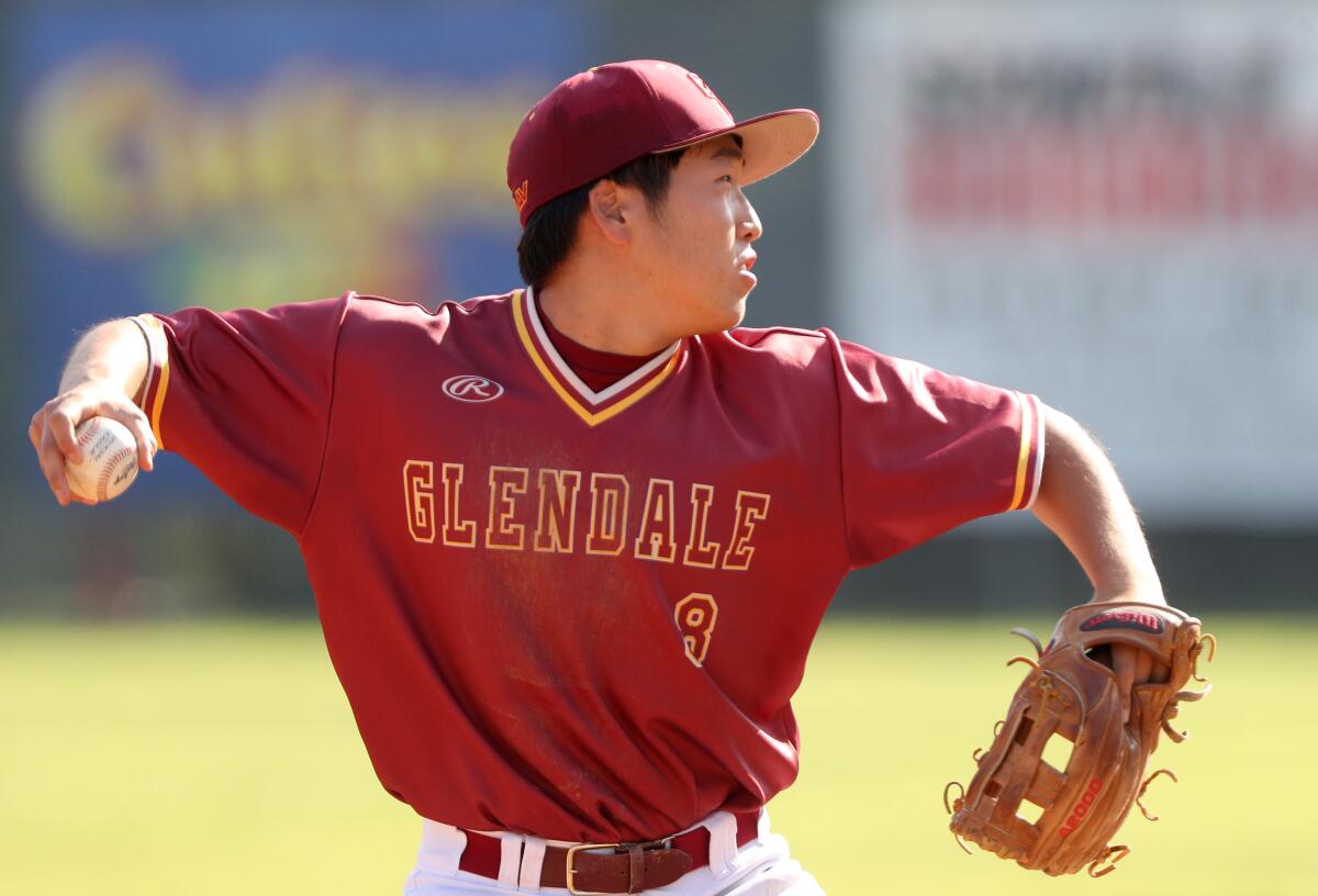 Glendale Community College baseball player Hans Seo throws the runner out during game vs. Cerritos College, at Stengel Field in Glendale on Saturday, Feb. 8, 2020.
