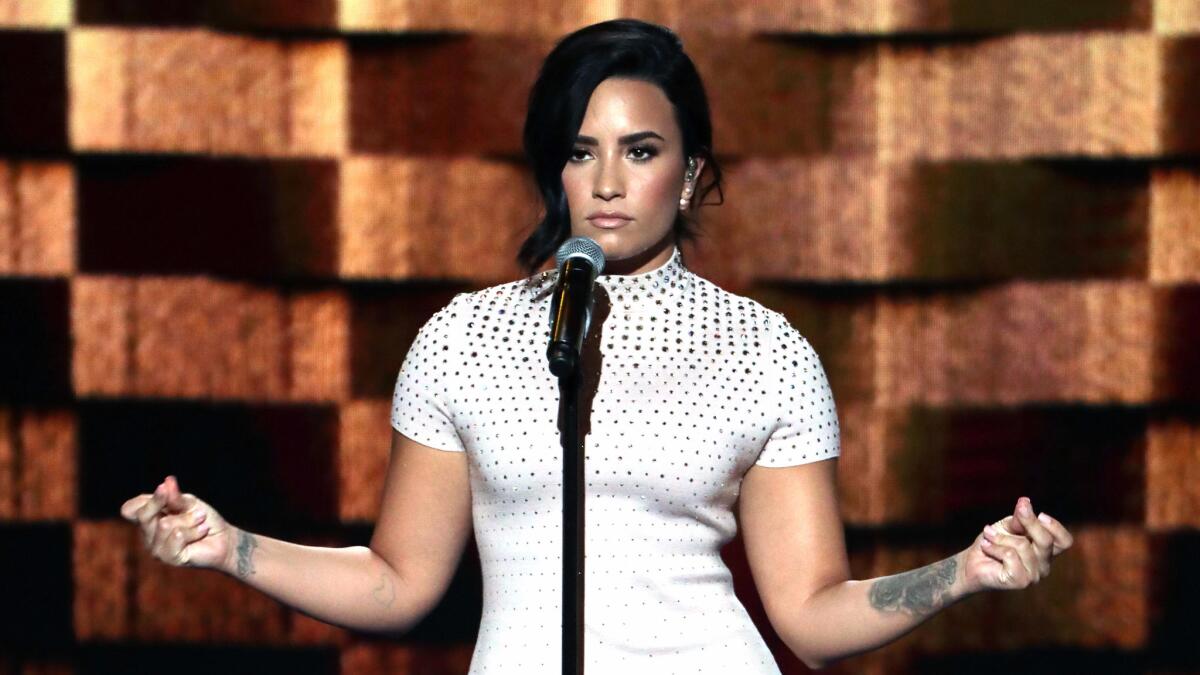 Pop singer Demi Lovato performs on the first day of the Democratic National Convention in Philadelphia.