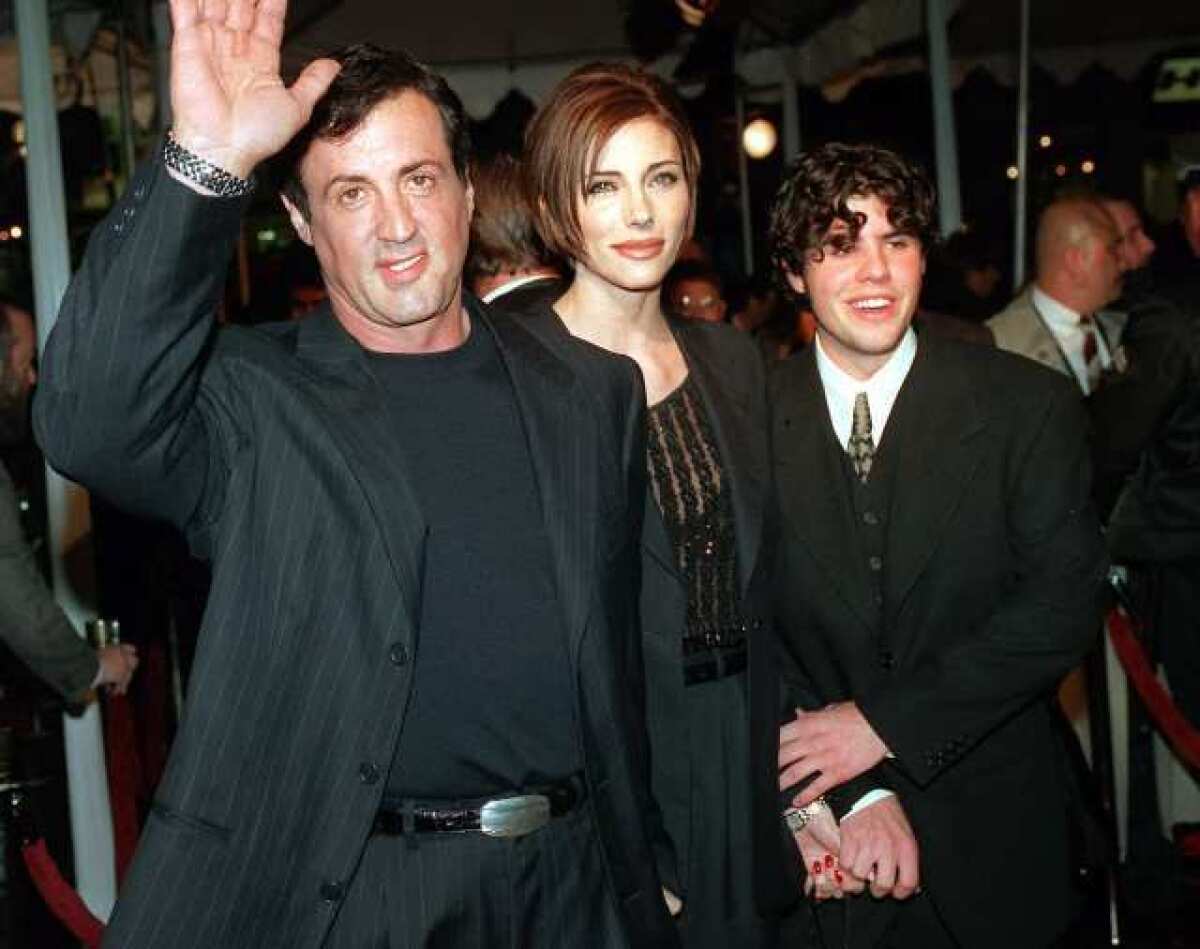 Sylvester Stallone, left, wife, Jennifer Flavin, and son Sage Stallone at the premiere of "Daylight" in 1996.