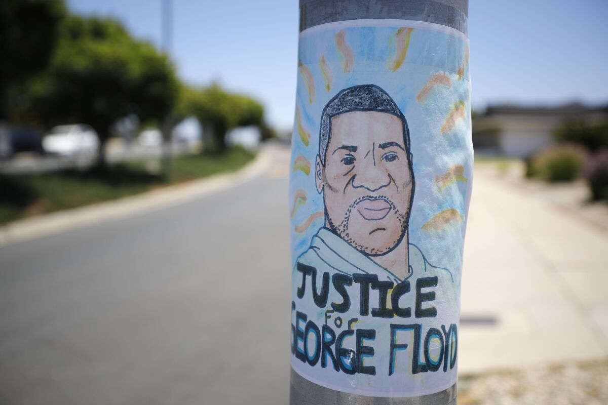 Black Lives Matter and Justice for George Floyd signs have appeared on streets signs in Del Cerro