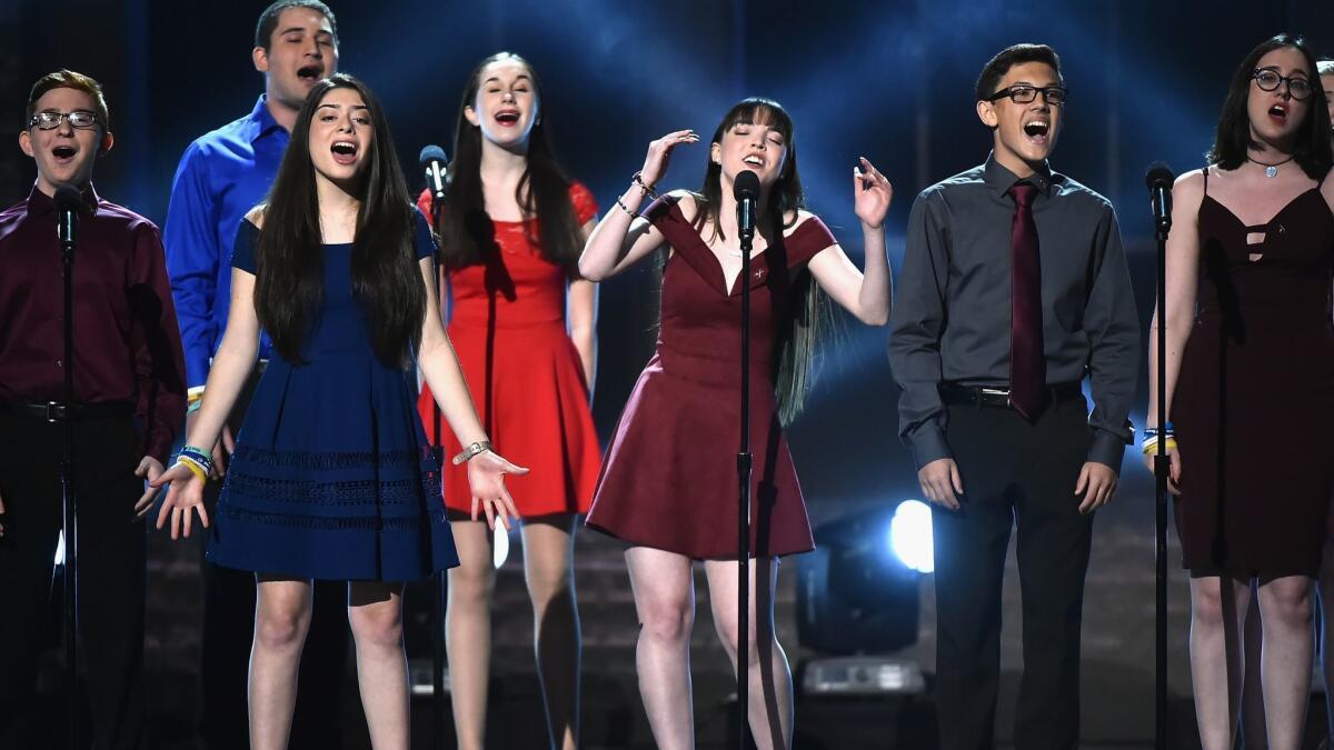 Marjory Stoneman Douglas High School drama students perform onstage during the 72nd Tony Awards at Radio City Music Hall in New York City on Sunday.