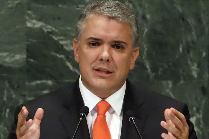 FILE - In this Wednesday, Sept. 26, 2018, file photo, Colombia's President Ivan Duque addresses the 73rd session of the United Nations General Assembly, at U.N. headquarters. Colombia's government says it is investigating a possible plot involving Venezuelans to assassinate President Ivan Duque. (AP Photo/Richard Drew, File)