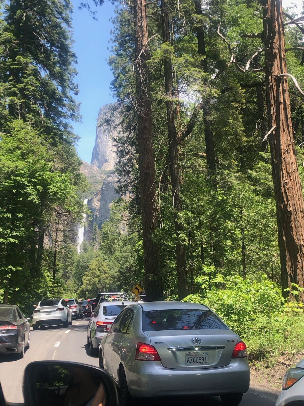 A trail of red brake lights lead toward Yosemite National Park the weekend of Juneteenth.