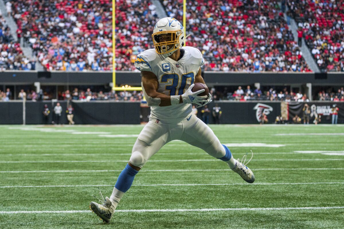 Chargers running back Austin Ekeler (30) catches a pass for a touchdown against the Atlanta Falcons.