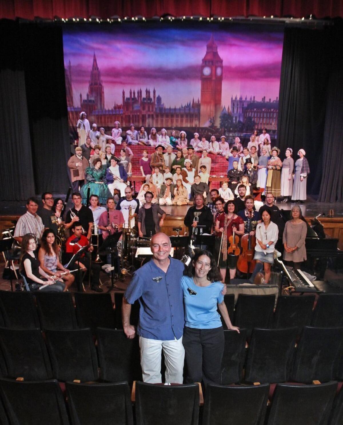 Associate producer Kurt Sawitskas and show producer April McCaffery with the cast, crew and orchestra for their next production Oliver, at Hoover High School in Glendale.