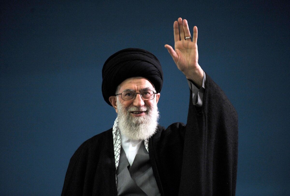Iran's supreme leader, Ayatollah Ali Khamenei, waves to a crowd during a meeting in Tehran.