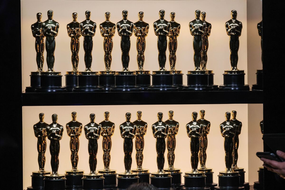 A shelf of Oscars statuettes