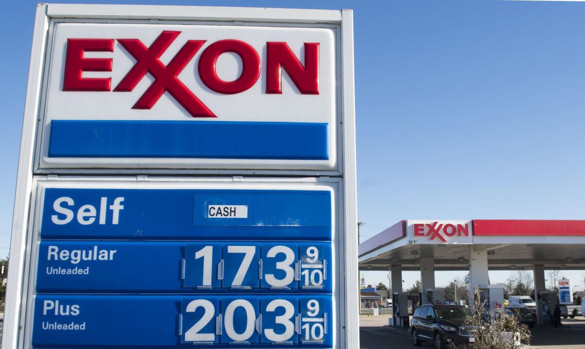Gas prices are displayed at an Exxon gas station in Virginia in 2016.
