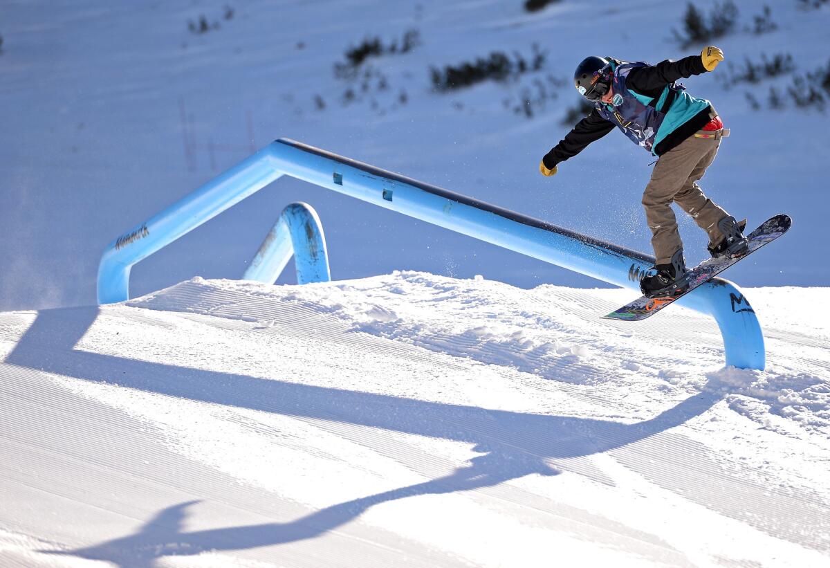 Spencer Link attempts a rail slide during the Men's Snowboarding Slopestyle Final U.S. Olympic Qualification #4 at Mammoth Mountain.